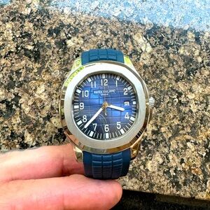 Men’s automatic steel luxury sports watch in midnight blue silicon strap.